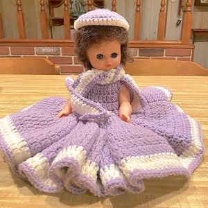 Vintage Doll wearing a Handmade Crocheted knitted Outfit late 60’s.